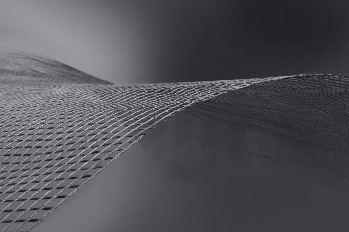 Solidian Grid ist ein nichtmetallisches Bewehrungsgitter, dessen textile Gelege in Epoxidharz getränkt und ausgehärtet werden